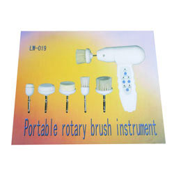 portable rotary brush instrument